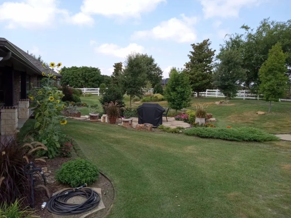 Custom landscape installation for residential properties in Newark, TX by Just You Way Lawn & Garden Service