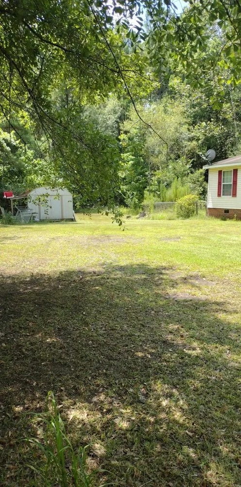 Trusted yard cleanup service for residential properties in Saint Stephen, SC by Justin E Holmes Handyman and Landscaping