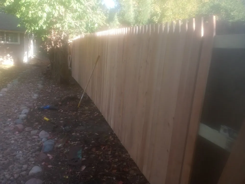 Custom lawn care service for year-round maintenance across Wichita, KS - Justin Empire Fences