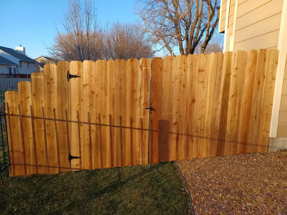 Custom lawn care service for homes in Wichita, KS by Justin Empire Fences