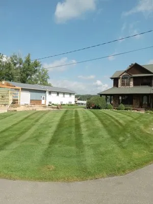 Justin goodrich lawn care Logo