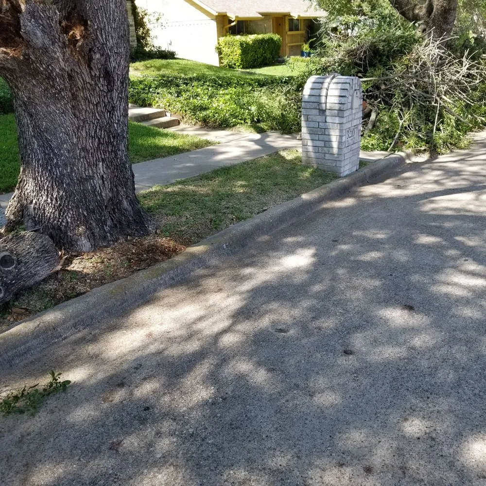 Expert lawn mowing service for beautiful yards across Garland, TX - JV Tree Service and Landscaping