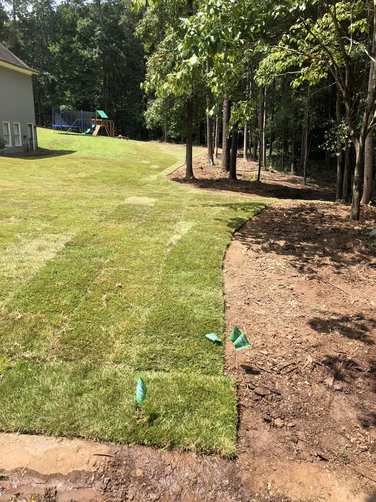 Custom lawn mowing service for residential properties across Woodstock, GA - JW Land Services