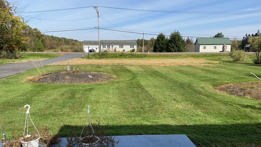 Professional lawn mowing service for homes in Central Square, NY by J&W Property Services