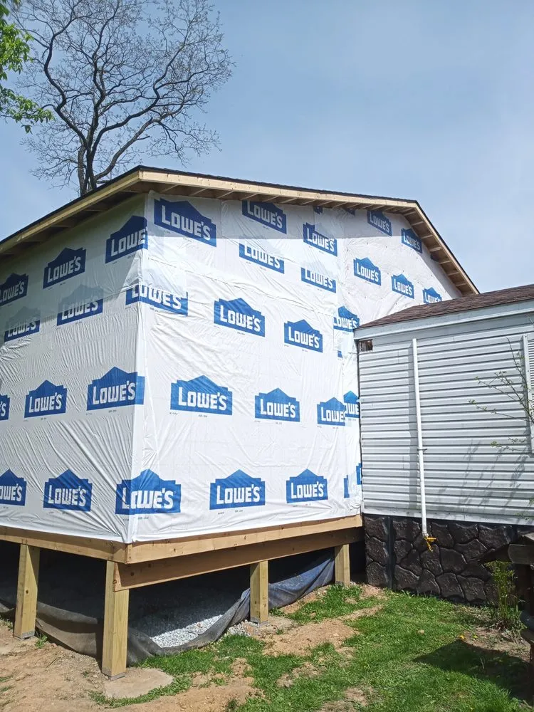 Local lawn mowing service for year-round maintenance in Uniontown, PA by JWL Renovations