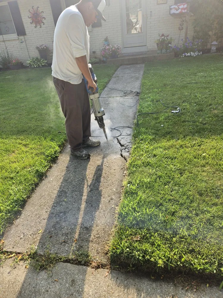 Affordable lawn care service in Caledonia, WI by JY General Construction