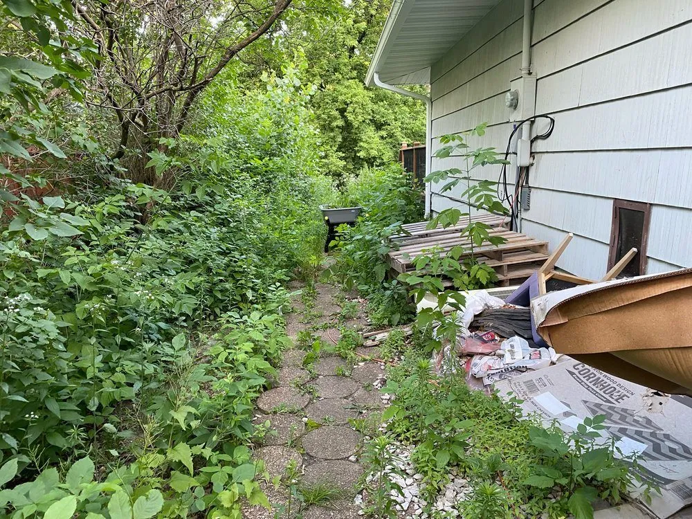 Local yard cleanup service for homes in White Bear Lake, MN by K & B Solutions