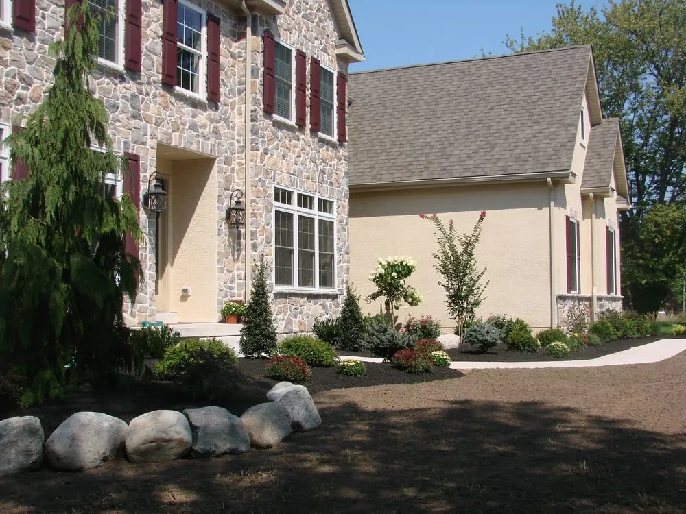 Custom landscaping services for residential properties in Warminster, PA by K & K Landscaping