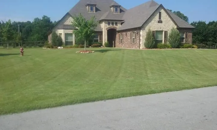 Affordable landscape installation for beautiful yards in Tulsa, OK by K & R Lawn & Lanscaping