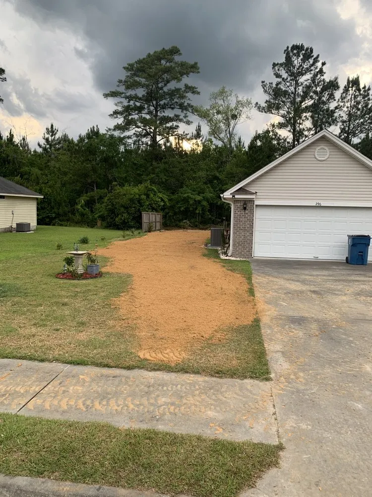 Expert lawn mowing service with custom design in Guyton, GA by K & S Tractor Service