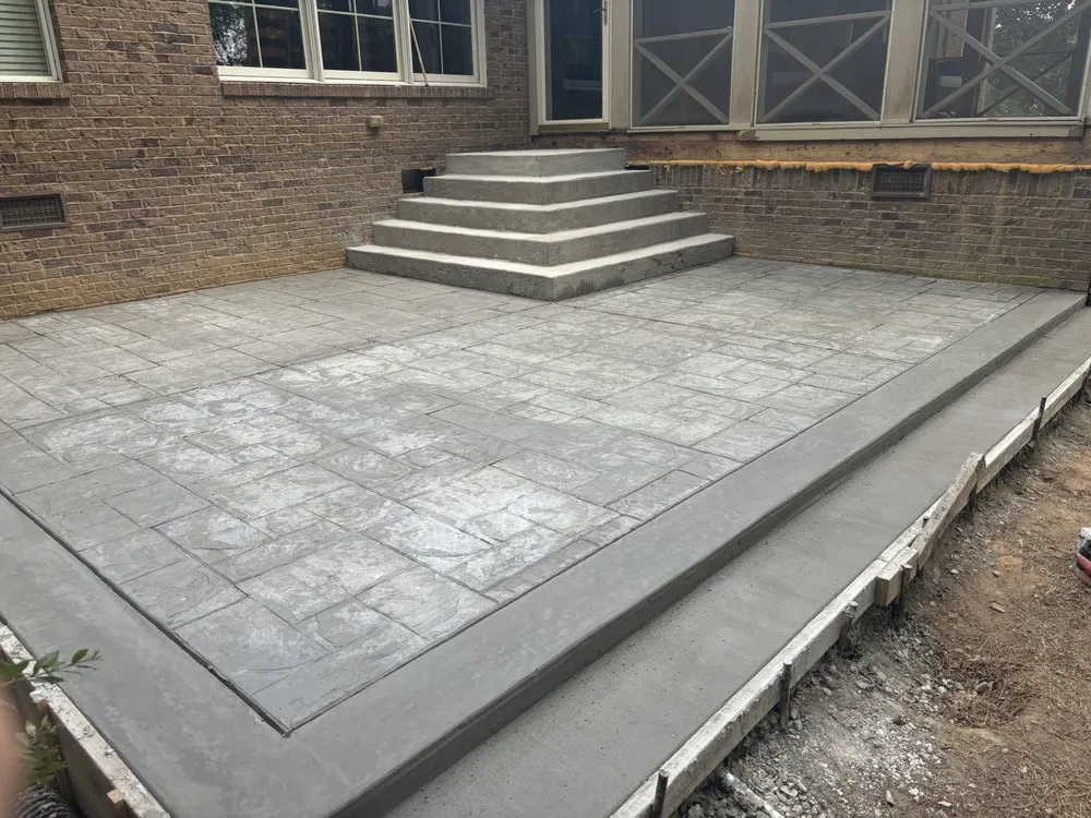 Custom lawn mowing service for outdoor upgrades across Iuka, MS - K & T Concrete Services