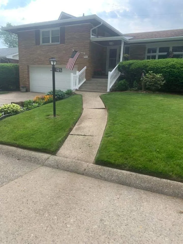 Professional garden landscaping with custom design in Youngstown, OH by K and D Lawn Specialist