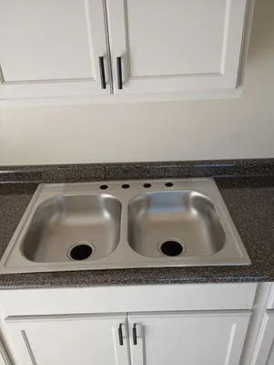 K Hobbs Property Maintenance And Home Repair Logo