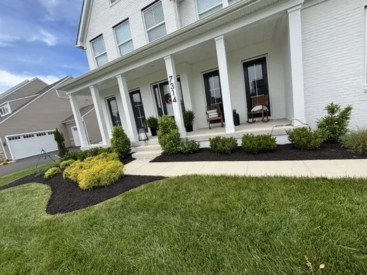 K M Landscaping Service Logo