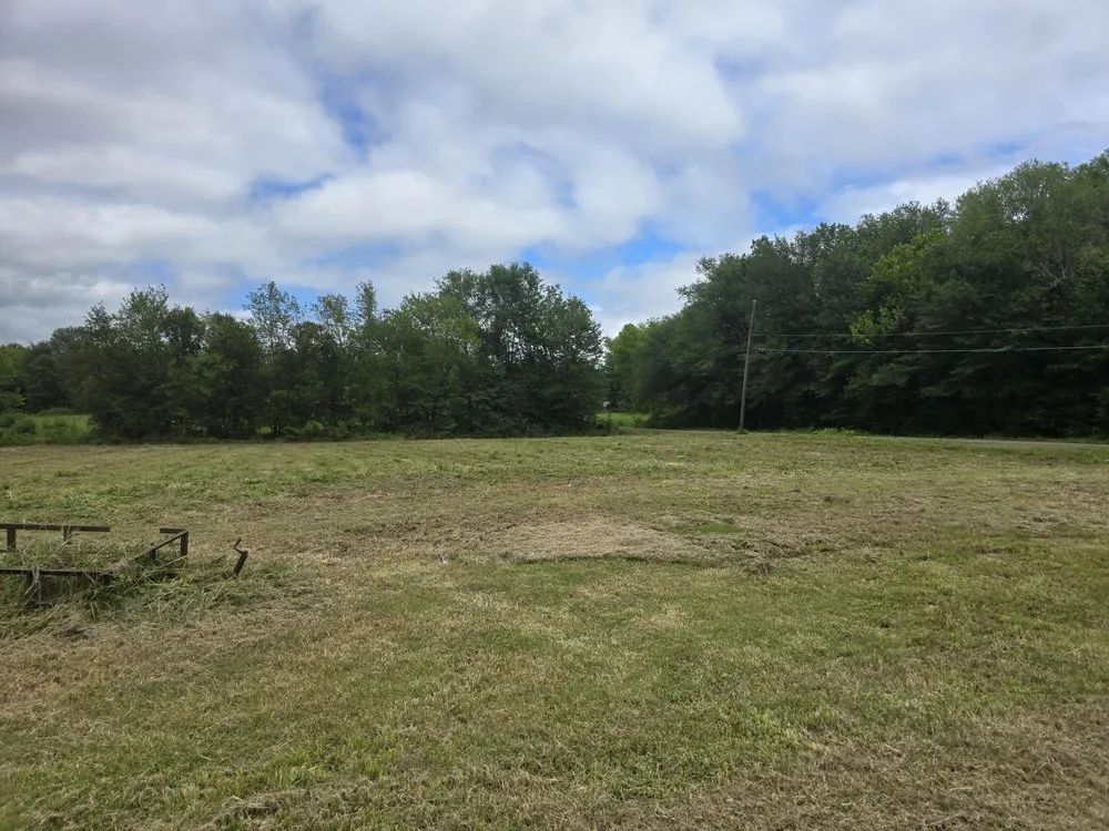 Custom landscape design for residential properties in Bogata, TX by K S Lawn Service