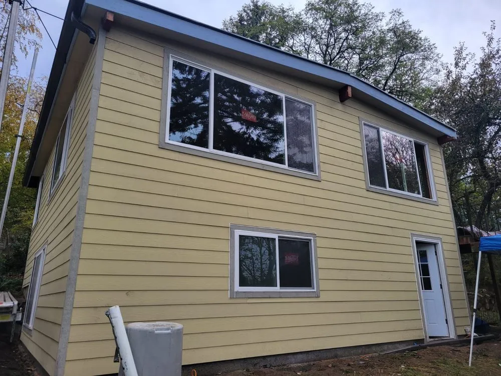 Professional lawn care service for year-round maintenance across Burien, WA - K Single Corp Roofing & General Contractor