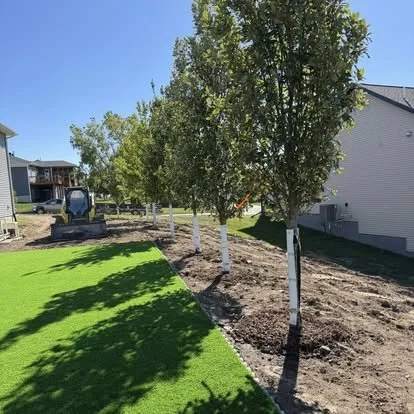 Trusted lawn mowing service with custom design across Wellman, IA - Kalonial Lawn Care