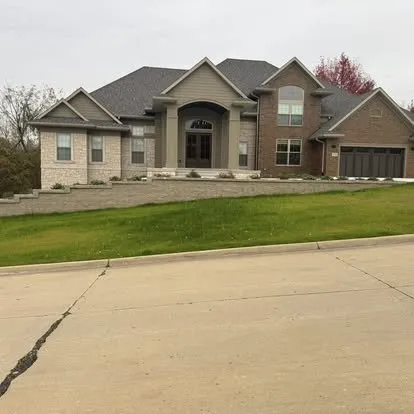 Affordable landscape design for outdoor upgrades in Wellman, IA by Kalonial Lawn Care