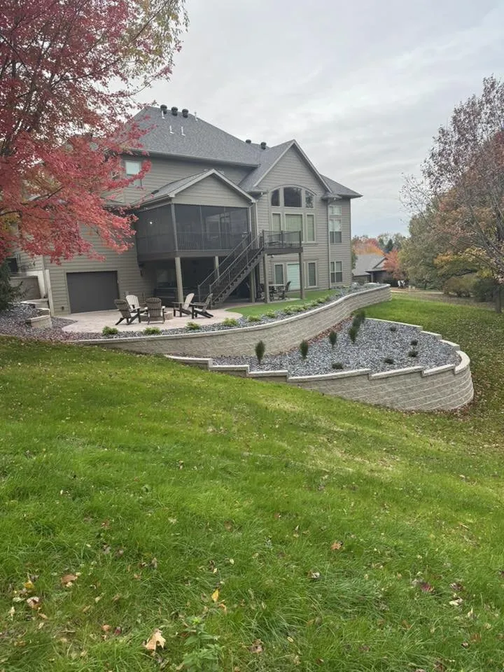 Affordable landscape design with custom design in Wellman, IA by Kalonial Lawn Care