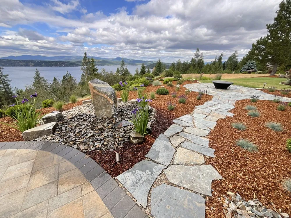 Reliable lawn mowing service for year-round maintenance in Post Falls, ID by Kaniksu Landscaping