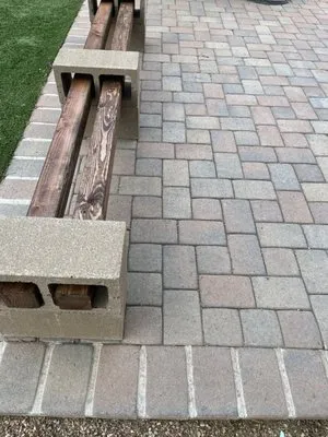 Kaptiian Landscaping and Maintenance Logo