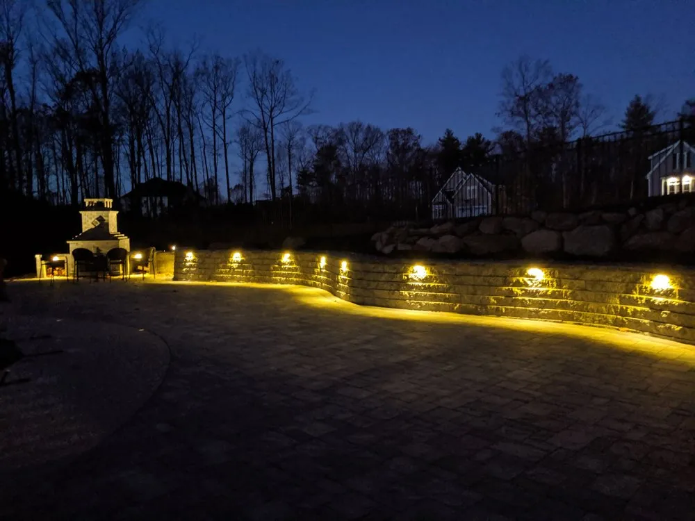 Affordable lawn care service for outdoor upgrades in Bow, NH by Karmic Landscapes