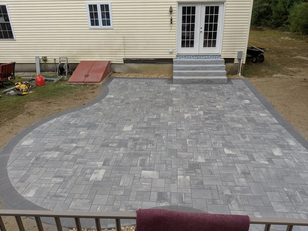 Local lawn mowing service for year-round maintenance across Bow, NH - Karmic Landscapes