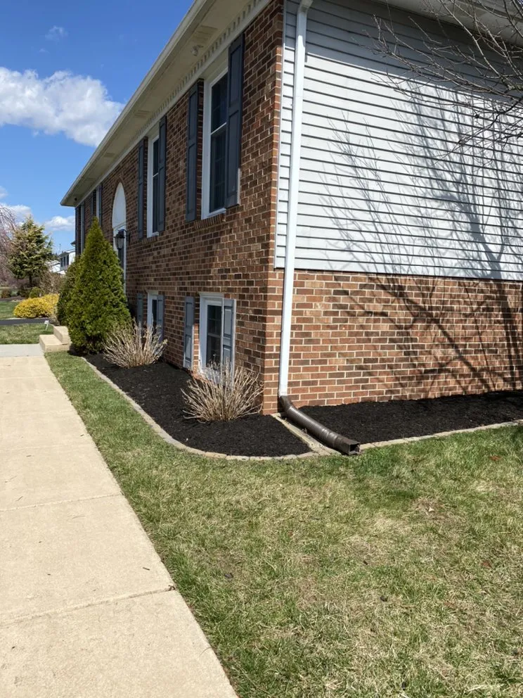 Affordable lawn mowing service for year-round maintenance in Bear, DE by Kase Landscaping