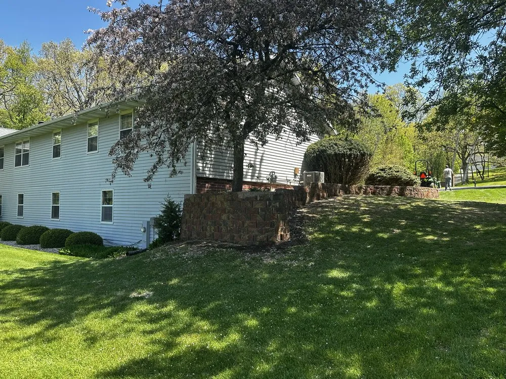 Affordable lawn care service for residential properties in Janesville, WI by Kastor Services