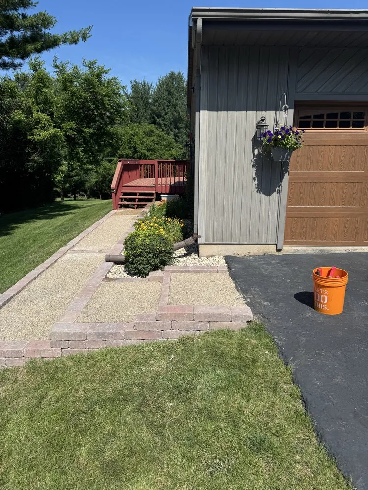 Expert landscaping services for homes in Janesville, WI by Kastor Services