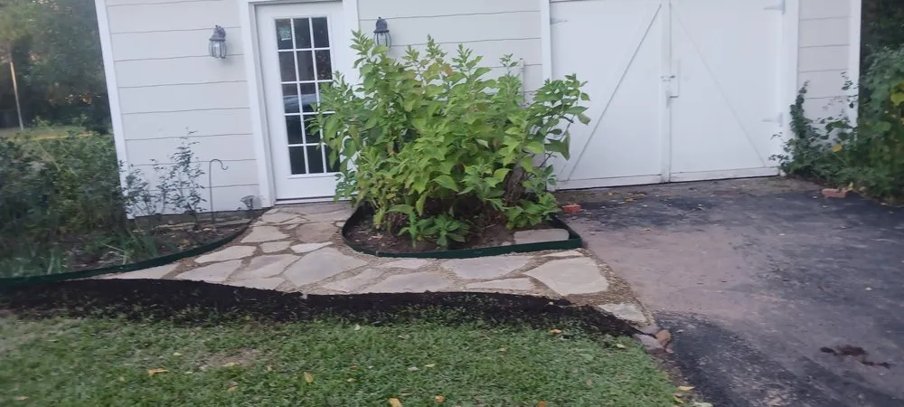 Custom lawn mowing service with custom design in Big Sandy, TX by Kat Weed Pulling Service