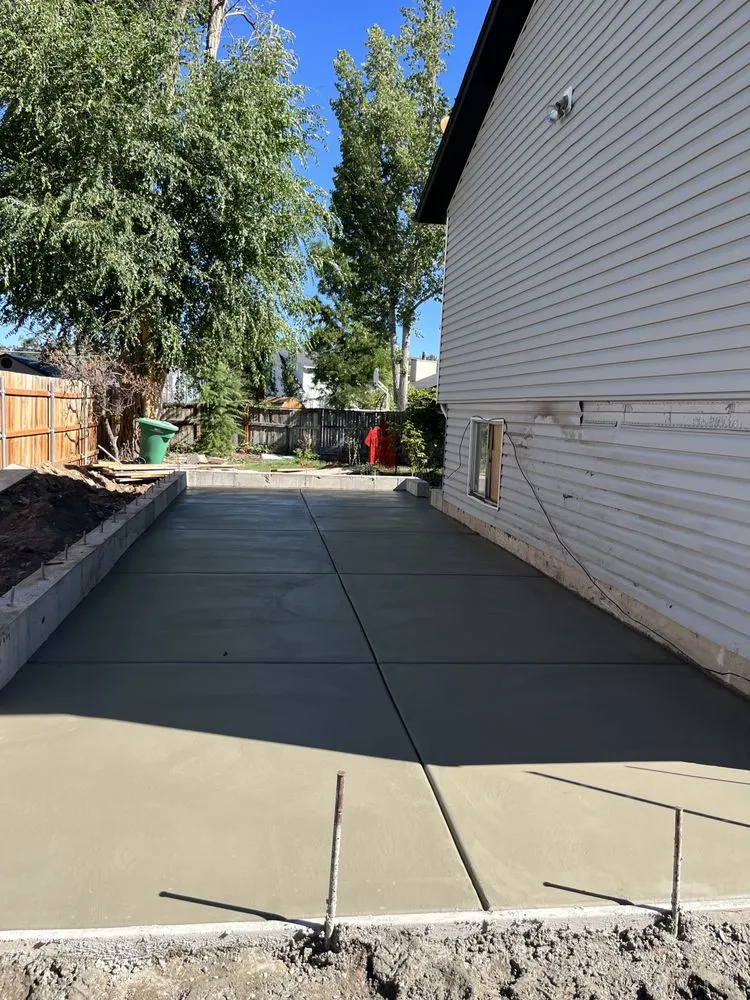 Professional yard maintenance in Sandy, UT by Kaumai Concrete