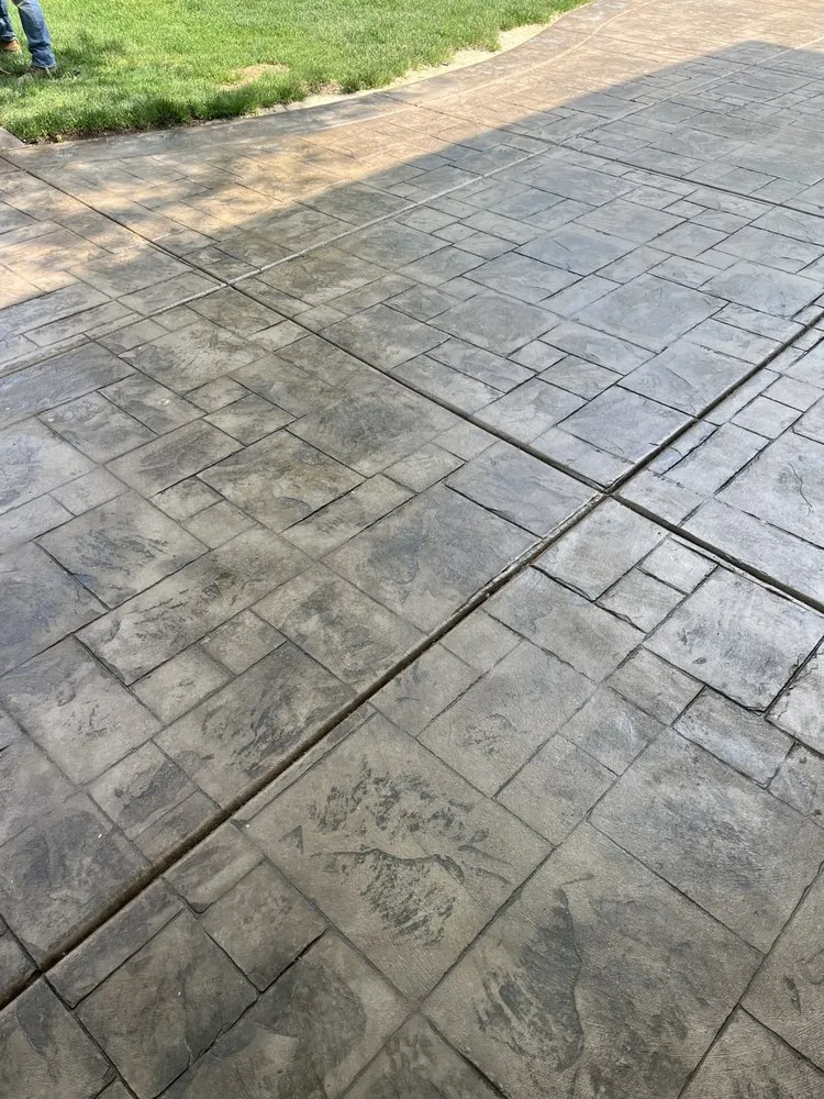 Custom lawn care service with custom design across Sandy, UT - Kaumai Concrete