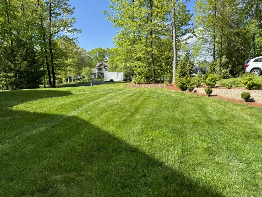 Affordable lawn mowing service for year-round maintenance in Auburn, NH by KB Lawn Care and Home Improvement