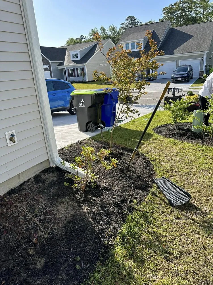 Custom outdoor landscaping in Loris, SC by KC Flowers