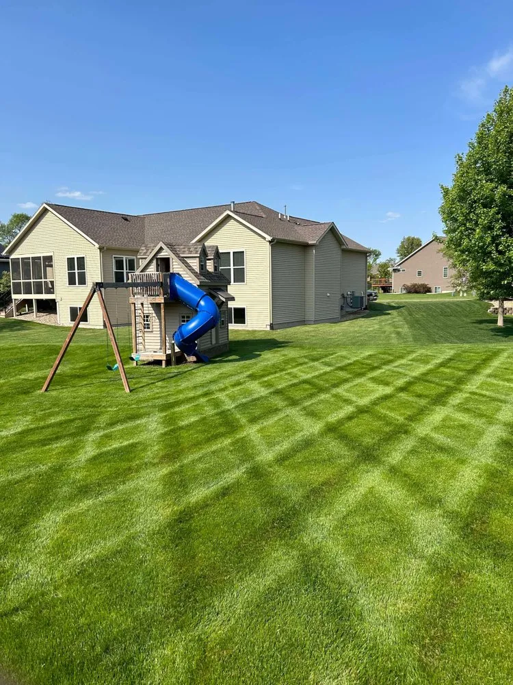 Trusted lawn mowing service for outdoor upgrades in Grimes, IA by KC Koncepts Landscaping & Snow Removal