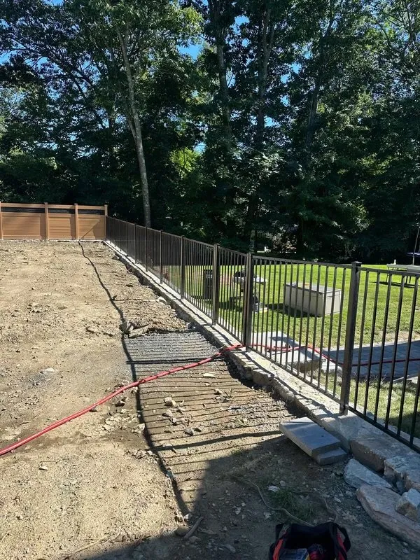 Custom landscape installation in Framingham, MA by KC Landscaping & Construction