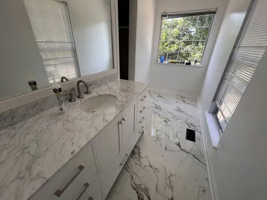 Kc Landscaping and Renovations Logo