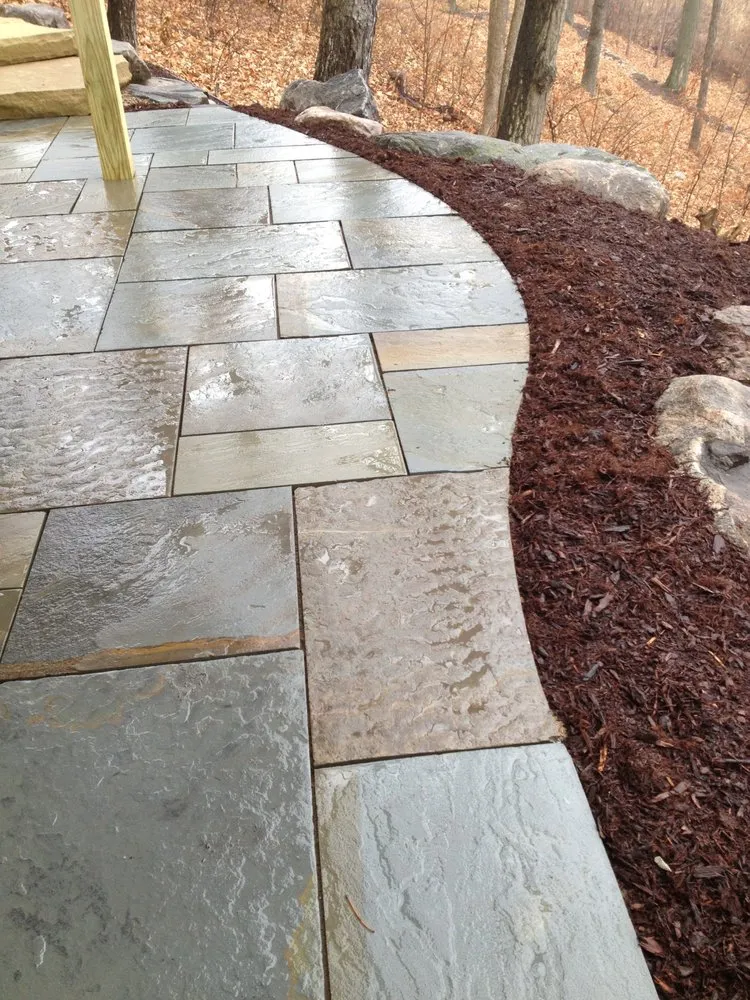 Local lawn mowing service with custom design in Milan, MI by KC Runciman Landscapes