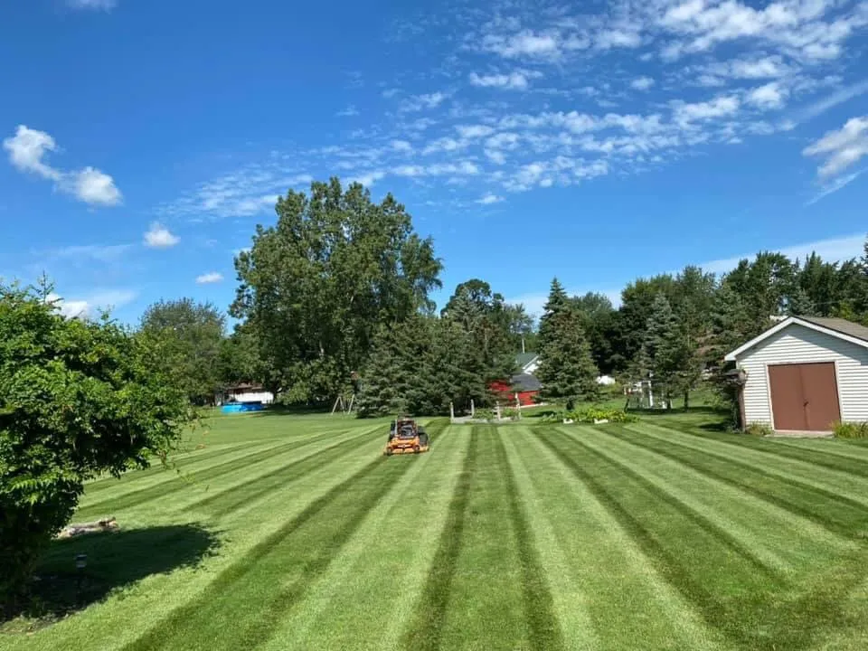 Professional yard cleanup service for residential properties across Grand Blanc, MI - K&D Outdoor Services