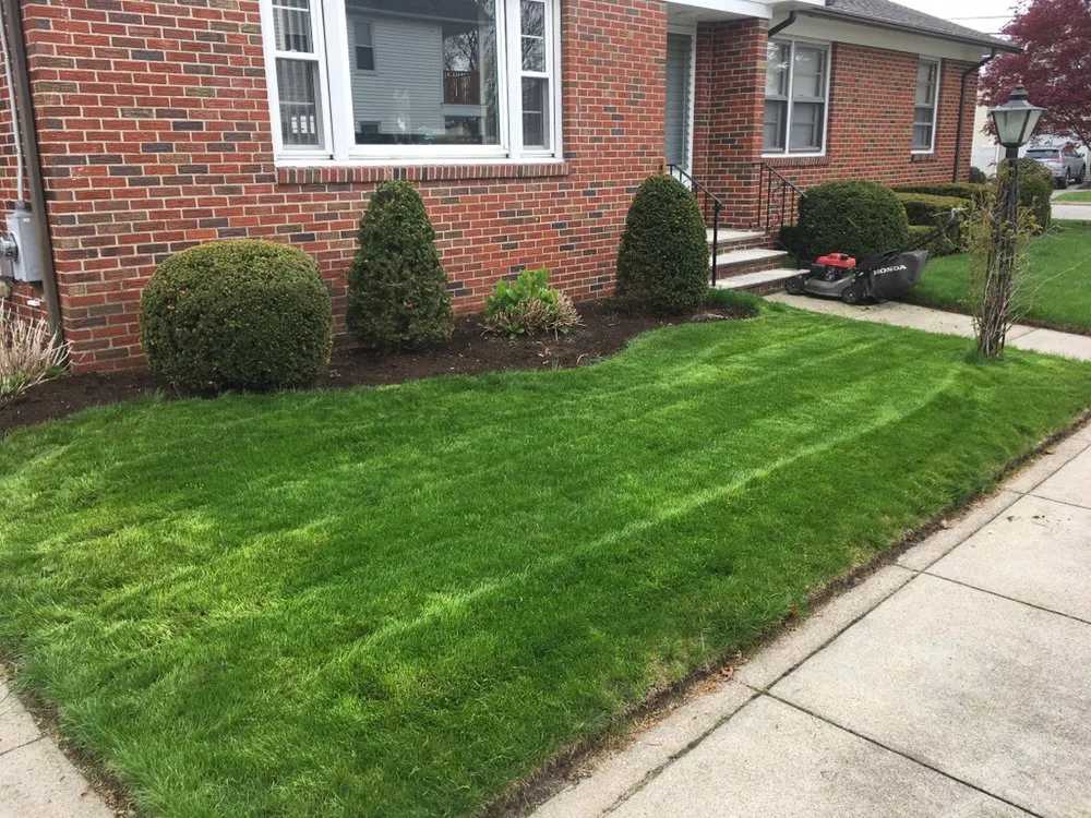 Trusted lawn care service for beautiful yards in Providence, RI by Keen Grounds Maintenance