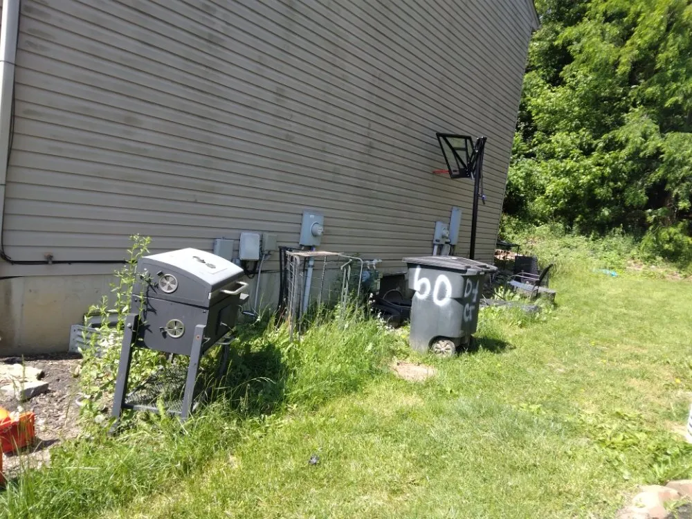 Custom yard cleanup service with custom design in Elsmere, KY by Keep It Short Lawn Care