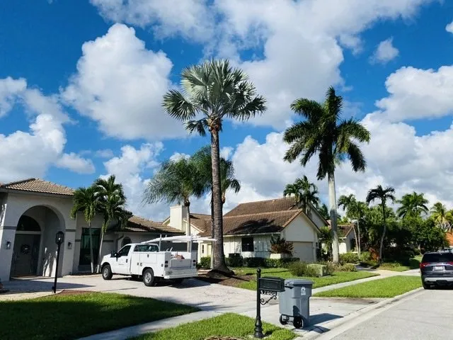 Local outdoor landscaping for year-round maintenance in Coral Springs, FL by Keeping iT Green