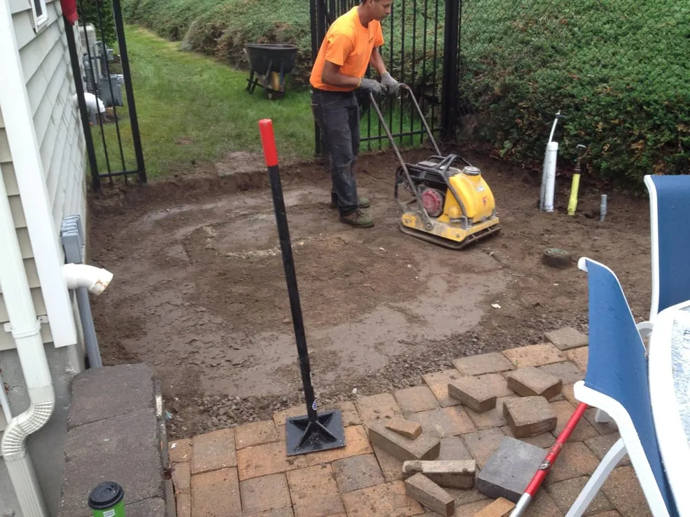 Affordable lawn care service with custom design in Stoughton, MA by Keith White Landscaping