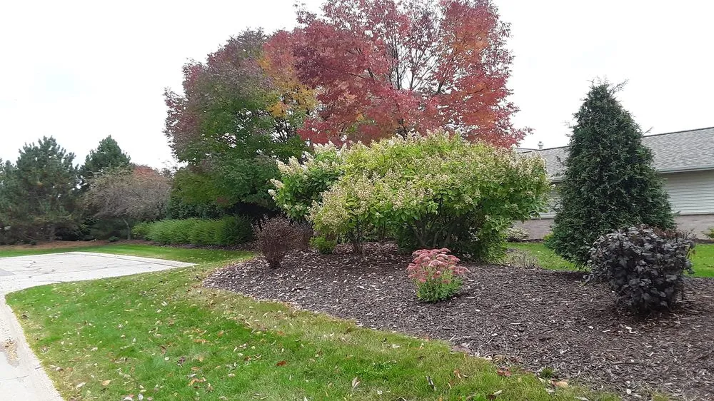 Custom garden landscaping in Green Bay, WI by Kelley & Son Lawn Care