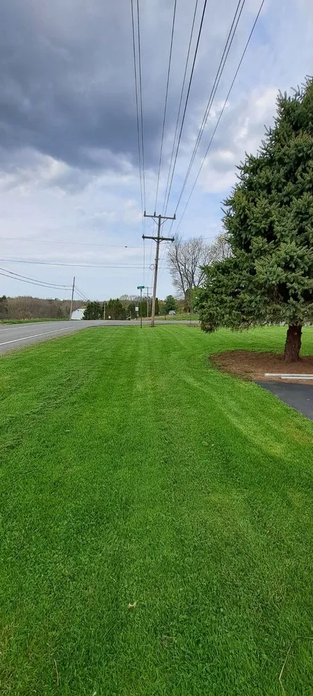 Local lawn mowing service for outdoor upgrades in Newark, NY by Kellogg's Lawn Care