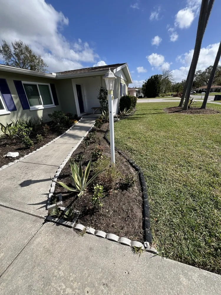 Local lawn mowing service for outdoor upgrades in Sarasota, FL by Kelly Lawn & Landscape