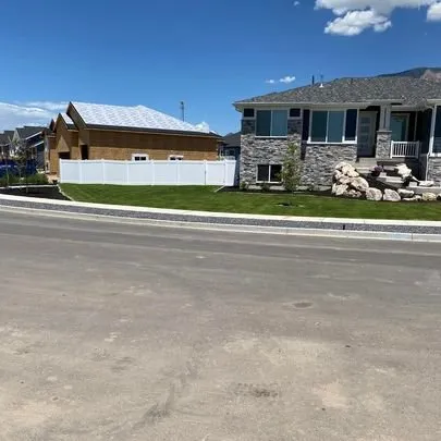 Custom yard maintenance for residential properties across Clinton, UT - Kelly PRO Services