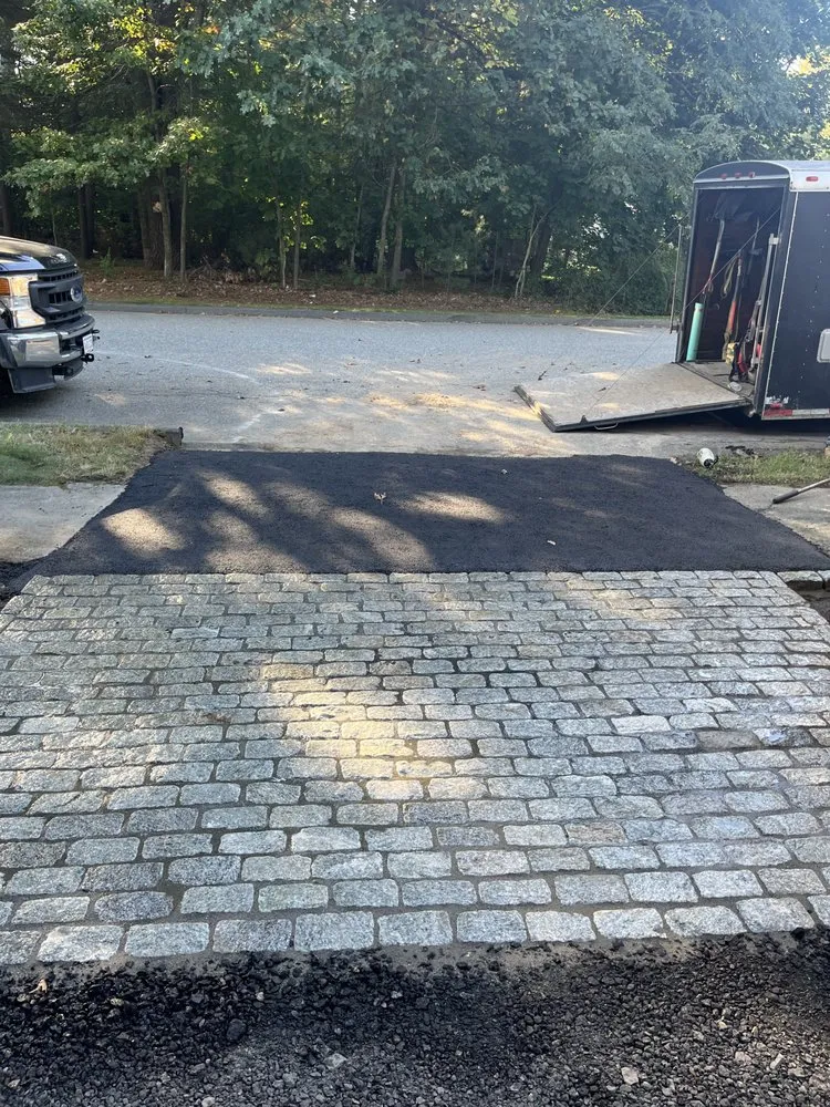 Affordable landscape design for residential properties in Tewksbury, MA by Kennedy Landscaping