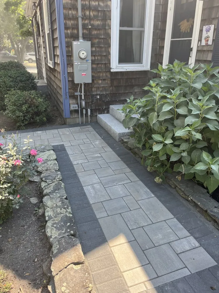 Custom landscape design for year-round maintenance in Tewksbury, MA by Kennedy Landscaping